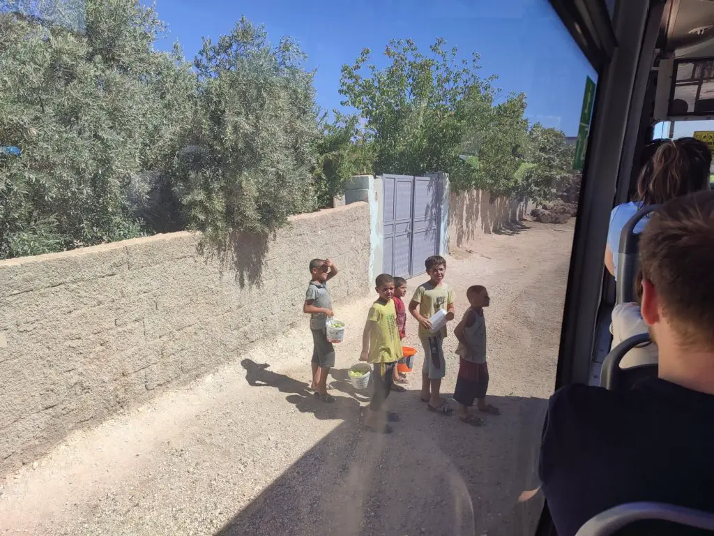Kids surrounding our bus to Göbekli Tepe