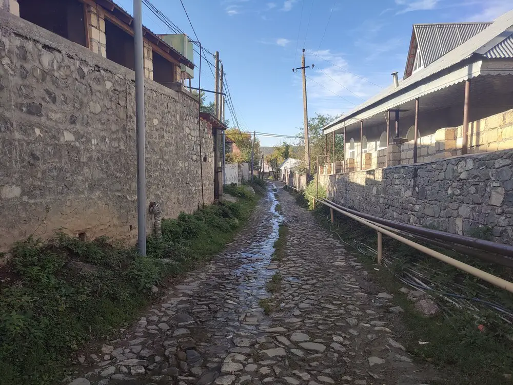 A cobblestone street in Sheki