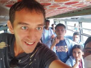 Hitchhiking in a school bus in Timor Leste