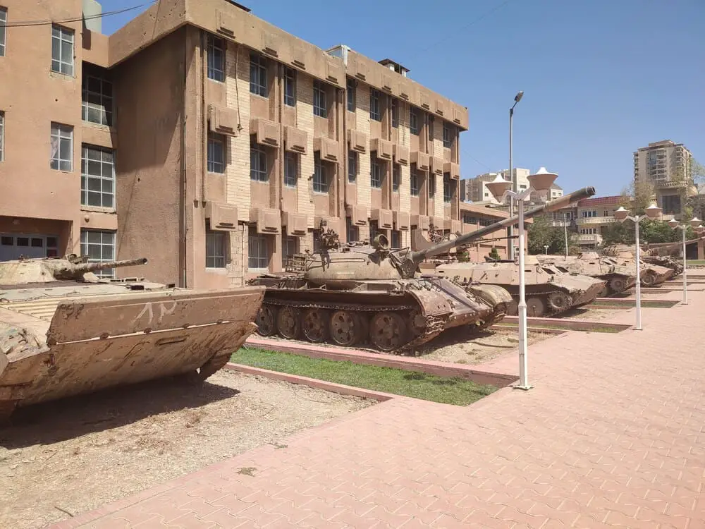 Tanks from the Iraqi War in front of the Amna Suraka Museum