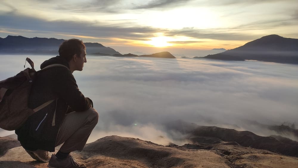 Simon watching the sunrise at Mount Bromo Crater