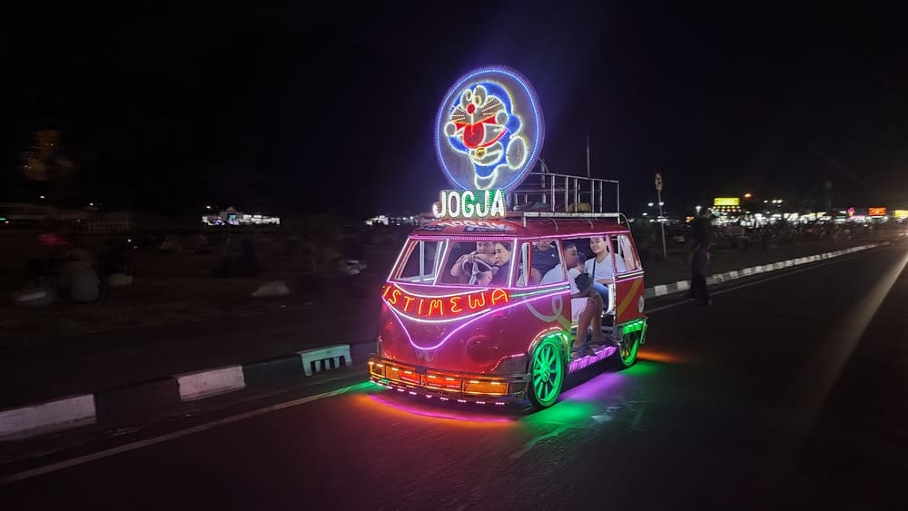 a neon pedaled minibus at alun-alun kidul