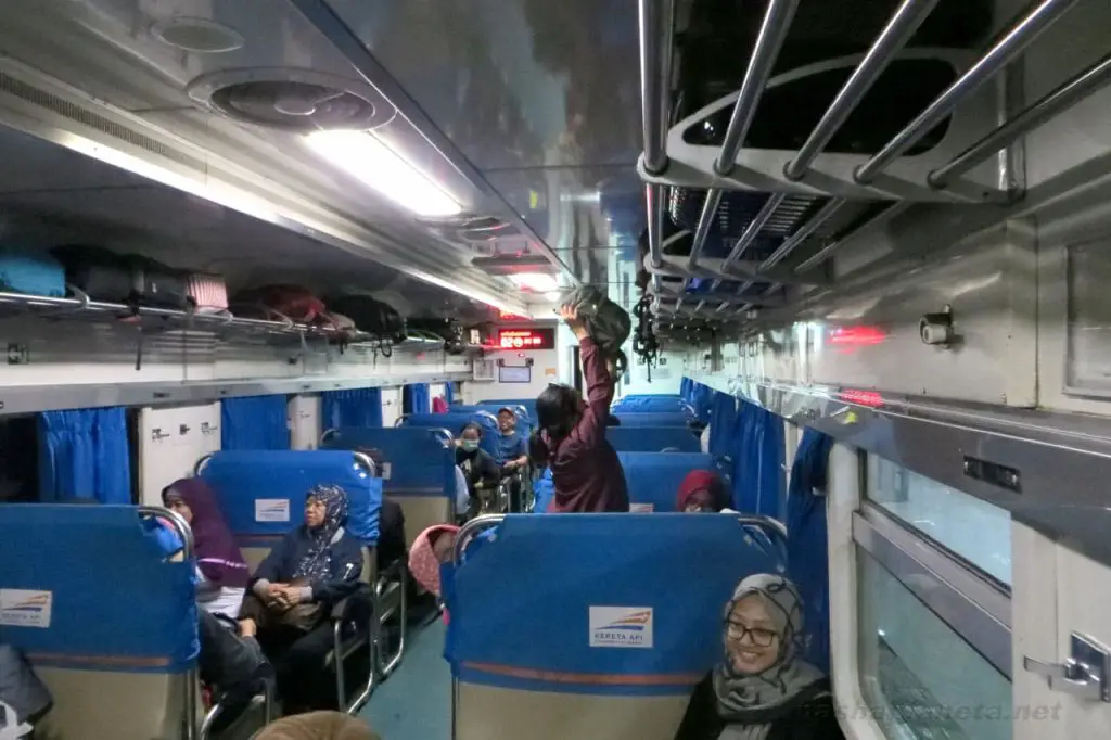 Overhead bins in an economy class train