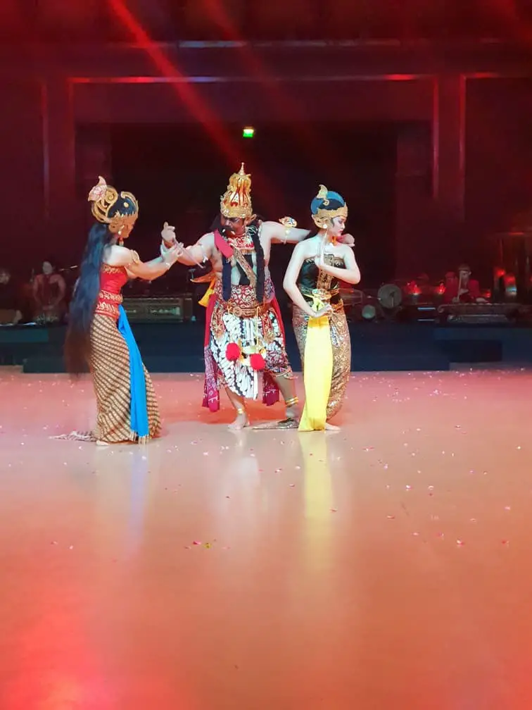 A scene from the Ramayana with 3 people on stage