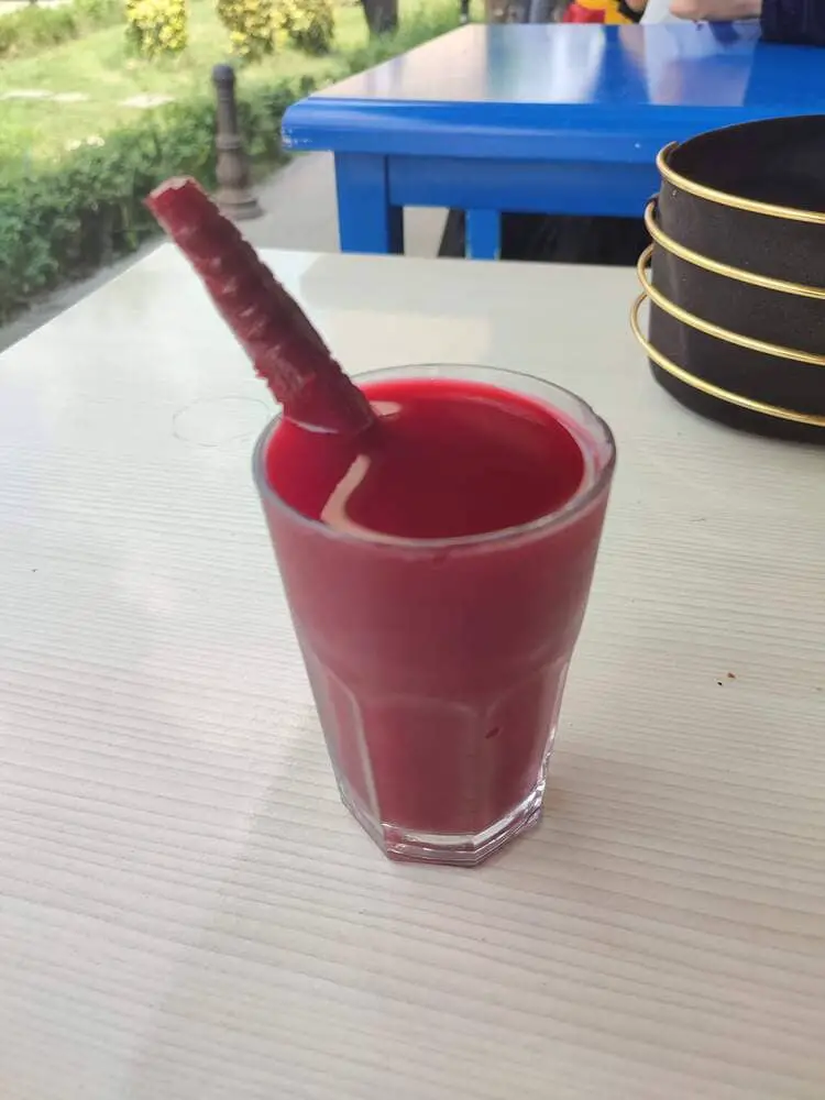 A glass with salgam and a turnip inside. Not all foods in Turkey are irresistibly tasty.