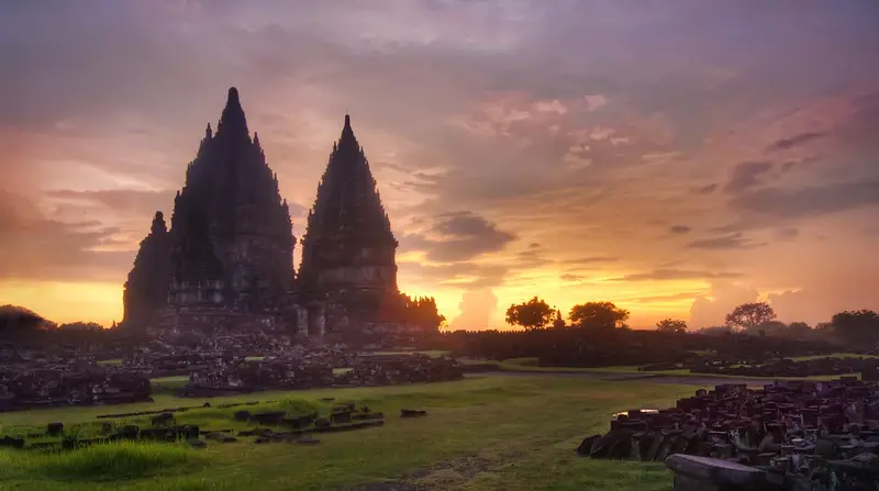 Sun setting behind Prambanan Temple