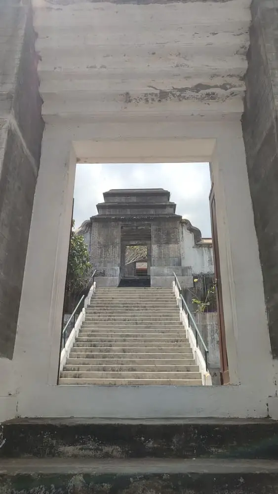 A gate with stairs leading to the Yogyakarta part of the Royal Cemetery at Imogiri