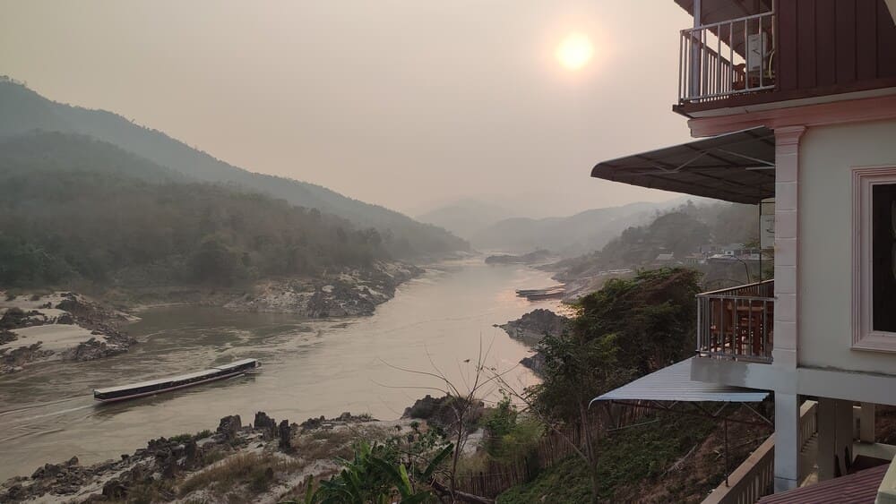 Burning season in Laos blocking the sun over the Mekong River