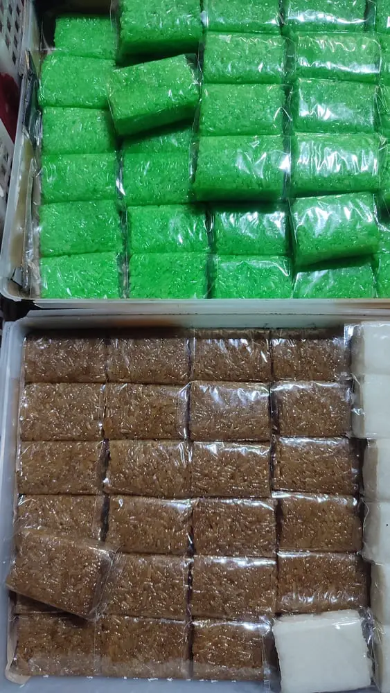 A box of wajik in green or brown color