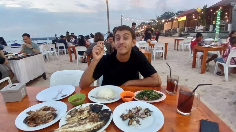 Me eating seafood at the beach