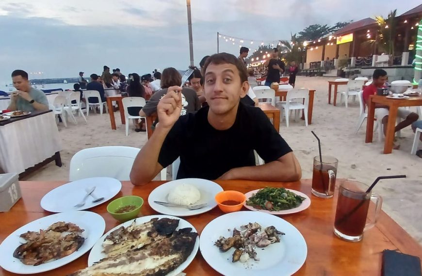 Me eating seafood at the beach