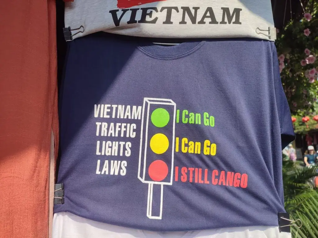 A t-shirt sold in Vietnam that shows a traffic light and says that you can go at any light. Traffic is one of the reasons I didn't like Vietnam