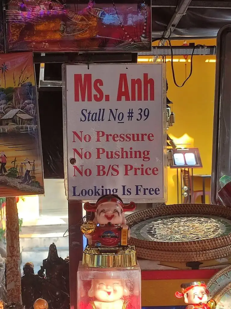 Ms Anh's sign that says "no pressure, no pushing, no b/s price, looking is free"