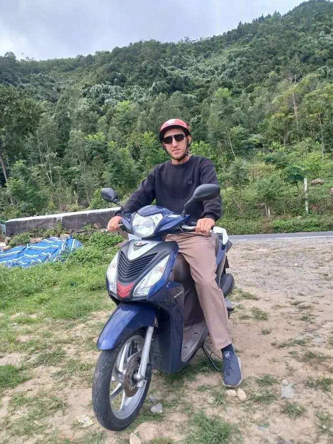 Simon on a motorcycle