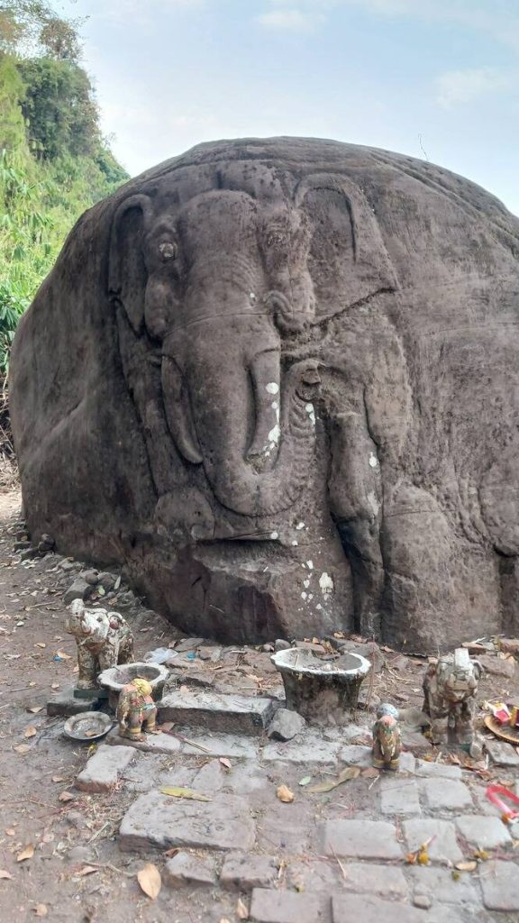 an elephant head relief near Vat Phou temple