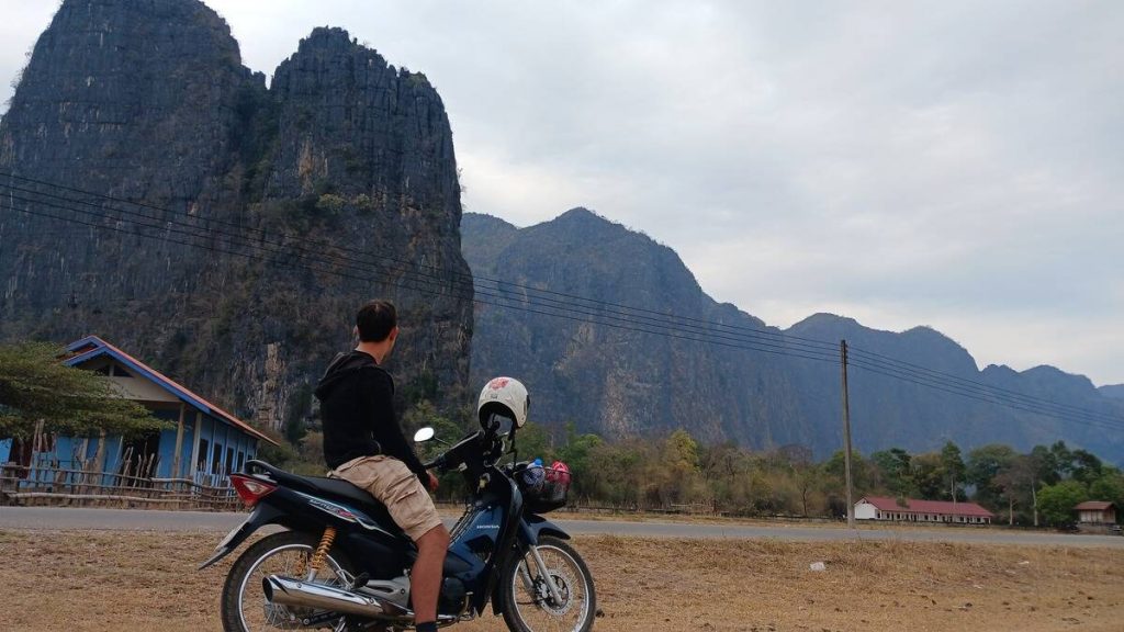 High karst mountains creating impressive scenery near Kong Lor village
