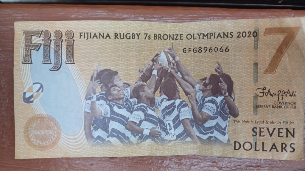 7 Fiji dollars banknote with rugby players