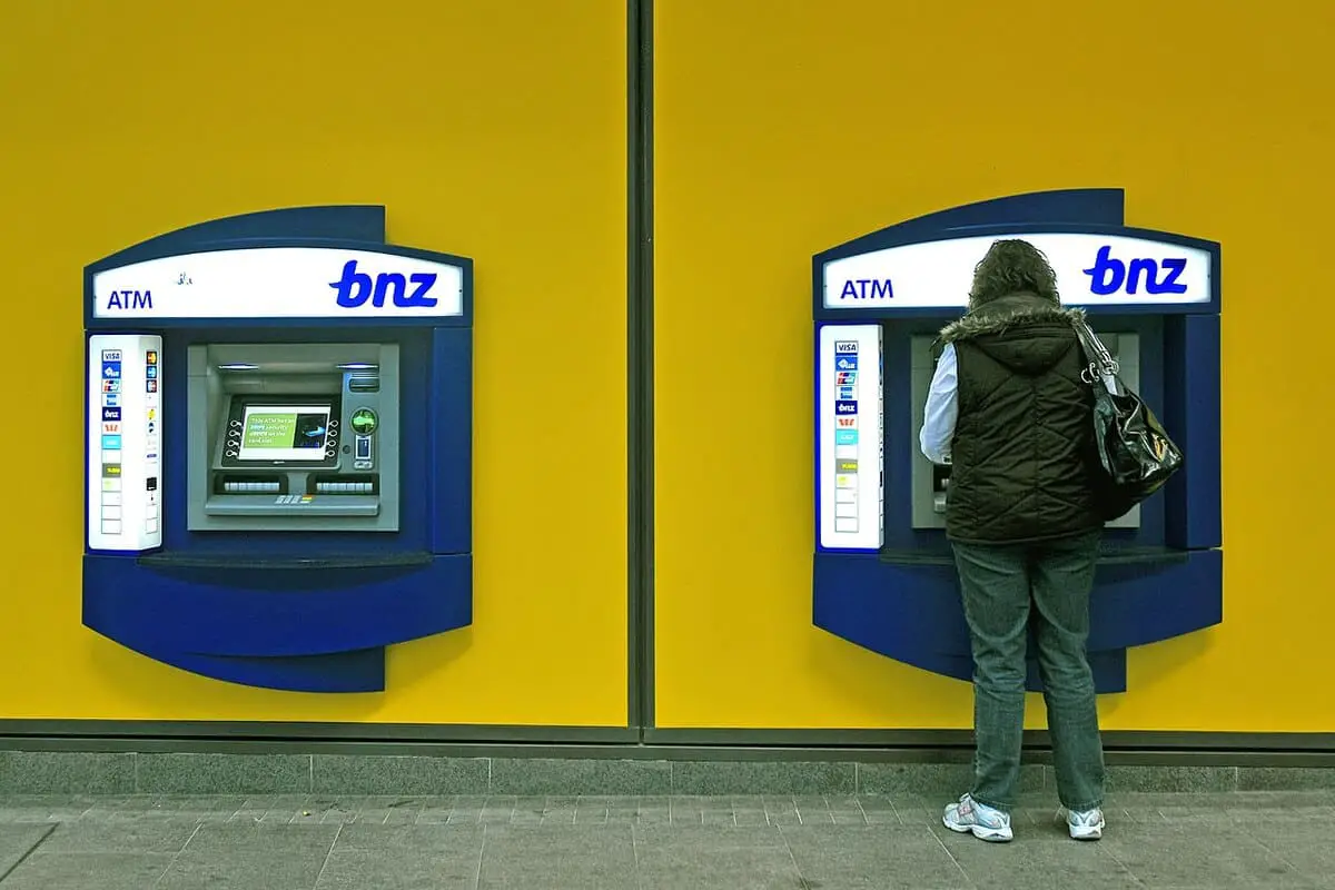 Two BNZ ATMs with 1 person using one of them