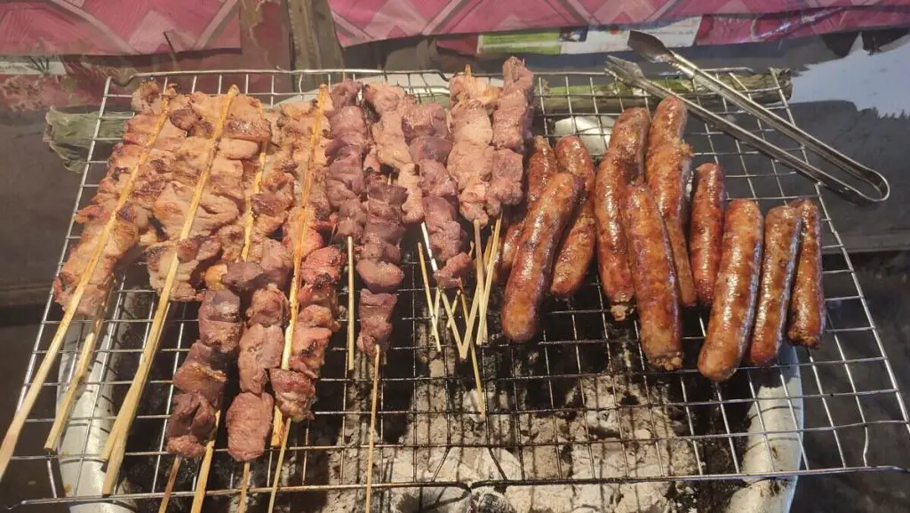 Grilled meat and sausages sold at the night market in Vientiane