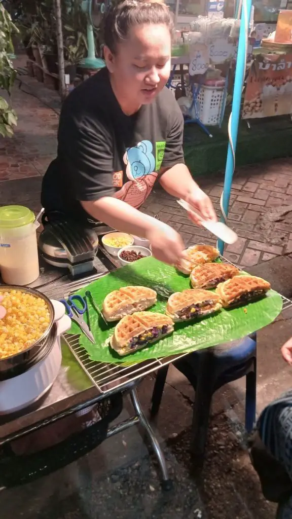 Woman selling waffles at Vientiane Night Market