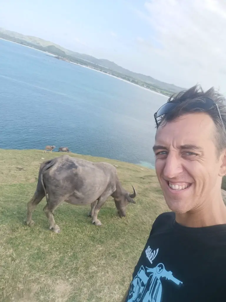 Simon taking a selfie with a water buffalo.