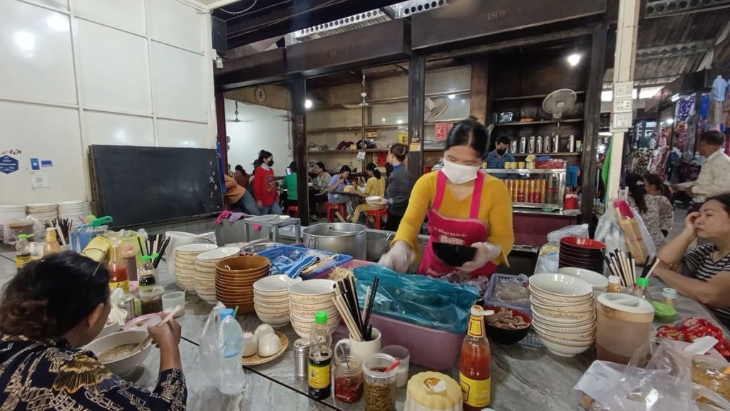 A vendor selling Kuy Teav noodle soup.
Eating breakfast like a local is one of the best things to do in Battambang!