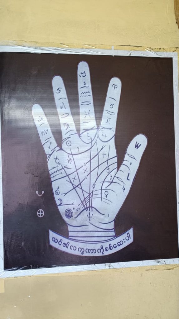 A palm with lines and numbers as used in palmistry