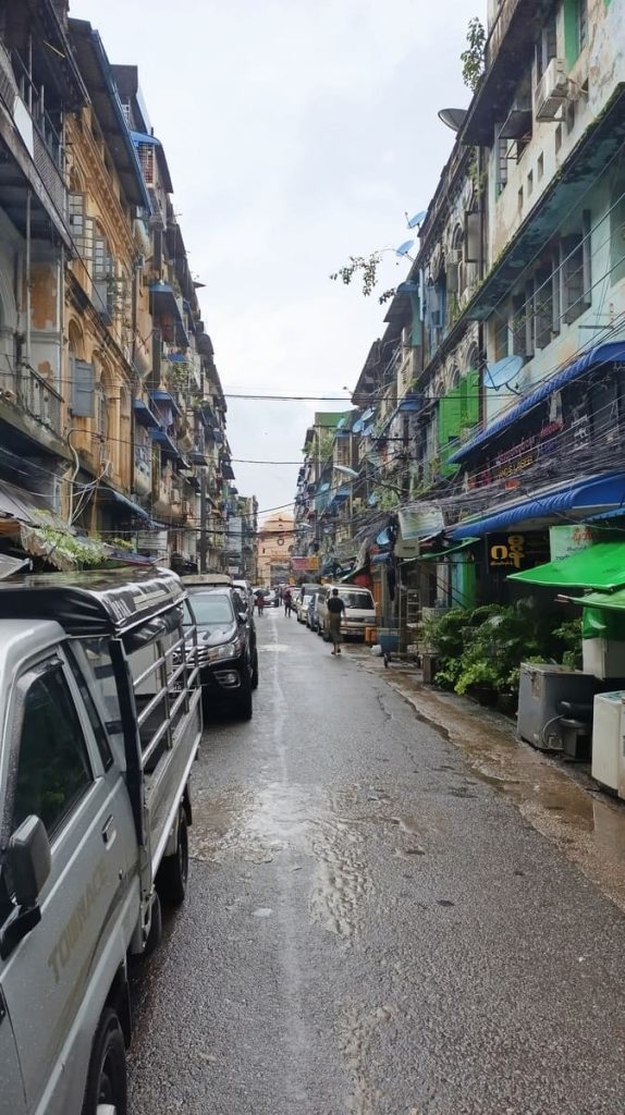 a street with parked cars