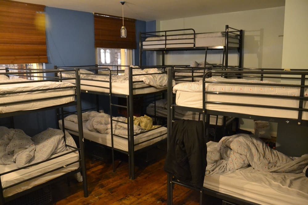 4 bunk beds inside a hostel dorm