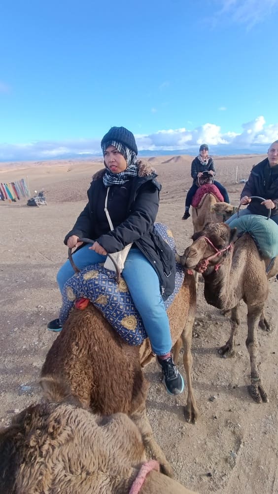 Yulli on the back of a camel