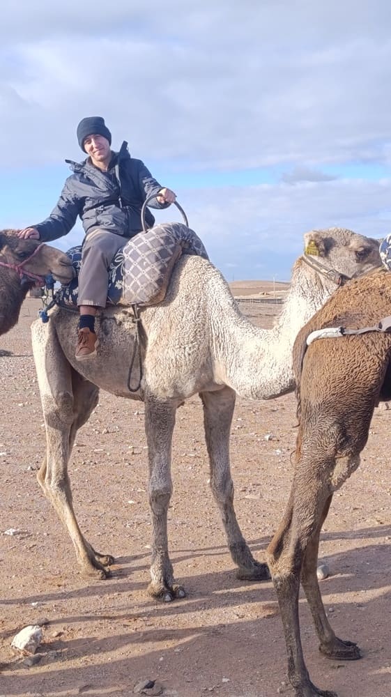 Simon on the back of a camel
