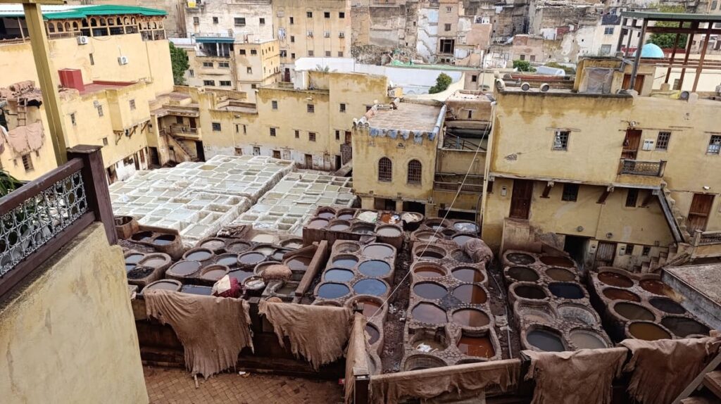 The tanneries in Fes from above - pits full of liquids of different colors.