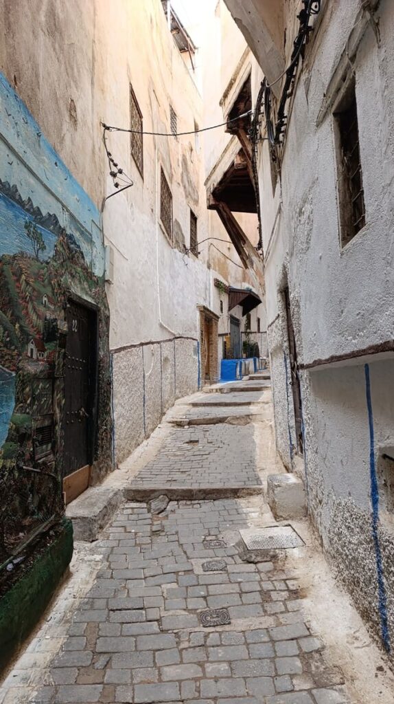 a narrow curved alley