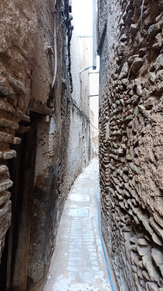 a narrow curved alley