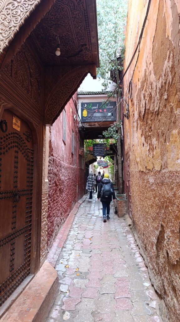 A narrow alley with the sky visible