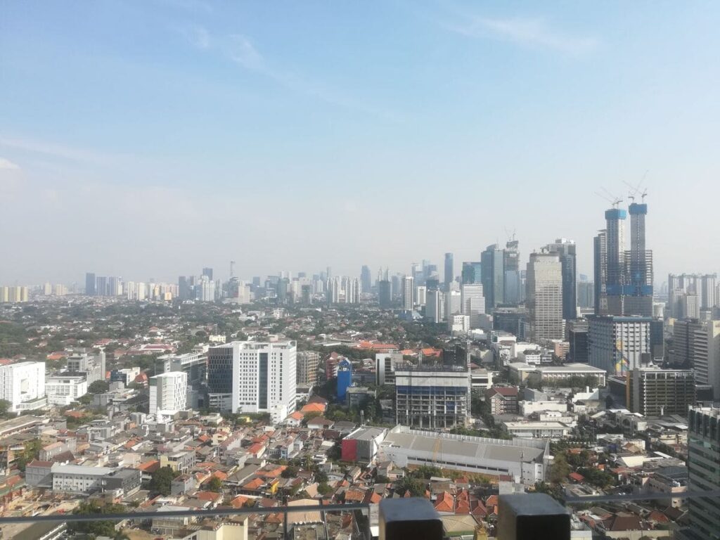 Jakarta's skyline. The air pollution visible on the picture answers the question: "Is Jakarta worth visiting?" with a resounding "no".